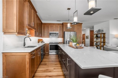 SIMPLY STUNNING COMPLETE RENOVATION of this upper level coach on  in Florida - for sale on GolfHomes.com, golf home, golf lot