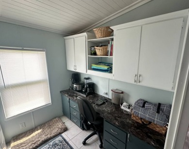 Lot Rent $1075 monthly     This beautiful 2-bedroom, 2 bathroom on Del Tura Golf and Country Club in Florida - for sale on GolfHomes.com, golf home, golf lot