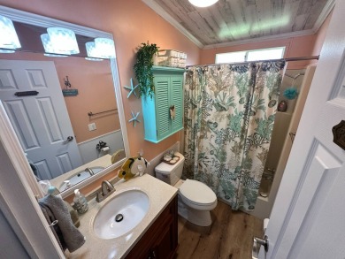 Lot Rent $1075 monthly     This beautiful 2-bedroom, 2 bathroom on Del Tura Golf and Country Club in Florida - for sale on GolfHomes.com, golf home, golf lot