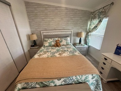 Lot Rent $1075 monthly     This beautiful 2-bedroom, 2 bathroom on Del Tura Golf and Country Club in Florida - for sale on GolfHomes.com, golf home, golf lot