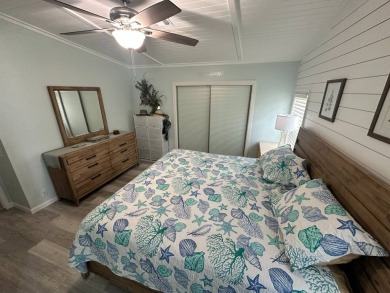 Lot Rent $1075 monthly     This beautiful 2-bedroom, 2 bathroom on Del Tura Golf and Country Club in Florida - for sale on GolfHomes.com, golf home, golf lot