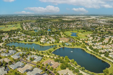 Welcome to this beautiful RANCH townhome situated on a premium on Carillon Lakes 3 Hole Course in Illinois - for sale on GolfHomes.com, golf home, golf lot