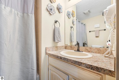 Welcome to your perfect Northern Michigan getaway! This on  in Michigan - for sale on GolfHomes.com, golf home, golf lot