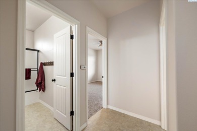 MLS# 287348 This finely crafted stone and stucco rambler sits on Horn Rapids Golf Club in Washington - for sale on GolfHomes.com, golf home, golf lot