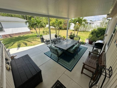 Lot Rent $1075 monthly     This beautiful 2-bedroom, 2 bathroom on Del Tura Golf and Country Club in Florida - for sale on GolfHomes.com, golf home, golf lot