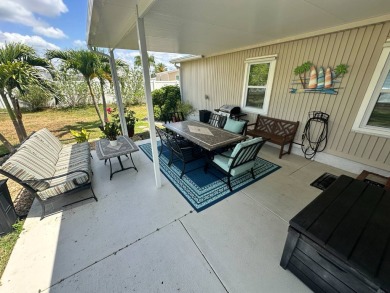 Lot Rent $1075 monthly     This beautiful 2-bedroom, 2 bathroom on Del Tura Golf and Country Club in Florida - for sale on GolfHomes.com, golf home, golf lot