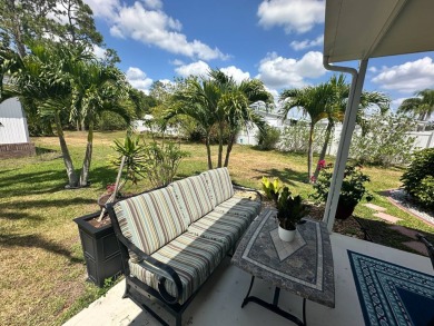 Lot Rent $1075 monthly     This beautiful 2-bedroom, 2 bathroom on Del Tura Golf and Country Club in Florida - for sale on GolfHomes.com, golf home, golf lot