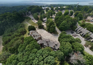 Welcome to your perfect Northern Michigan getaway! This on  in Michigan - for sale on GolfHomes.com, golf home, golf lot