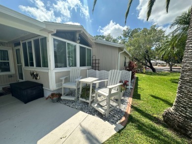 Lot Rent $1075 monthly     This beautiful 2-bedroom, 2 bathroom on Del Tura Golf and Country Club in Florida - for sale on GolfHomes.com, golf home, golf lot