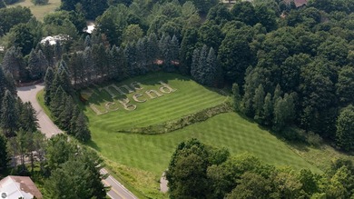 Welcome to your perfect Northern Michigan getaway! This on  in Michigan - for sale on GolfHomes.com, golf home, golf lot