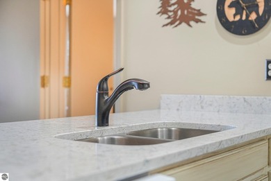 Welcome to your perfect Northern Michigan getaway! This on  in Michigan - for sale on GolfHomes.com, golf home, golf lot