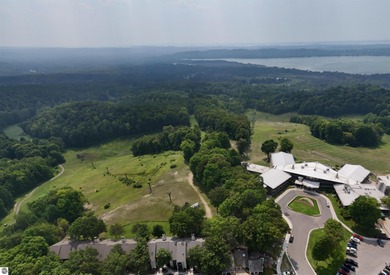 Welcome to your perfect Northern Michigan getaway! This on  in Michigan - for sale on GolfHomes.com, golf home, golf lot