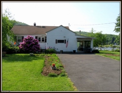 Proudly offered by the son of the first owner, this hidden gem on Lake Lackawanna Golf Course in New Jersey - for sale on GolfHomes.com, golf home, golf lot