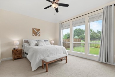 Modern farmhouse-style home backing to gorgeous HOA maintained on The Tribute At the Colony in Texas - for sale on GolfHomes.com, golf home, golf lot