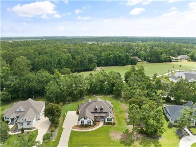 Situated within the prestigious gated community of Oak Grove on Oak Grove Island Golf and Country Club in Georgia - for sale on GolfHomes.com, golf home, golf lot