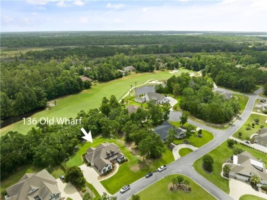 Situated within the prestigious gated community of Oak Grove on Oak Grove Island Golf and Country Club in Georgia - for sale on GolfHomes.com, golf home, golf lot