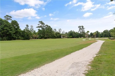 Situated within the prestigious gated community of Oak Grove on Oak Grove Island Golf and Country Club in Georgia - for sale on GolfHomes.com, golf home, golf lot