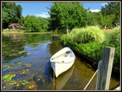 Proudly offered by the son of the first owner, this hidden gem on Lake Lackawanna Golf Course in New Jersey - for sale on GolfHomes.com, golf home, golf lot