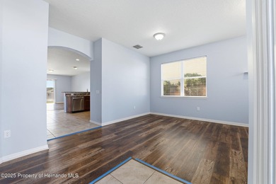 One or more photo(s) has been virtually staged. Located within on Sherman Hills Golf Club in Florida - for sale on GolfHomes.com, golf home, golf lot