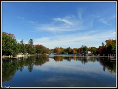 Proudly offered by the son of the first owner, this hidden gem on Lake Lackawanna Golf Course in New Jersey - for sale on GolfHomes.com, golf home, golf lot