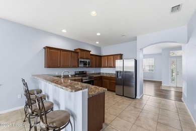 One or more photo(s) has been virtually staged. Located within on Sherman Hills Golf Club in Florida - for sale on GolfHomes.com, golf home, golf lot