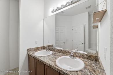 One or more photo(s) has been virtually staged. Located within on Sherman Hills Golf Club in Florida - for sale on GolfHomes.com, golf home, golf lot