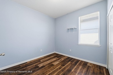 One or more photo(s) has been virtually staged. Located within on Sherman Hills Golf Club in Florida - for sale on GolfHomes.com, golf home, golf lot