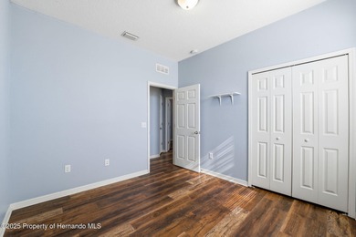 One or more photo(s) has been virtually staged. Located within on Sherman Hills Golf Club in Florida - for sale on GolfHomes.com, golf home, golf lot