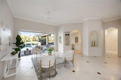 Luxury and Lifestyle welcome you to this updated home that lives on University Park Country Club in Florida - for sale on GolfHomes.com, golf home, golf lot