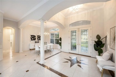 Luxury and Lifestyle welcome you to this updated home that lives on University Park Country Club in Florida - for sale on GolfHomes.com, golf home, golf lot