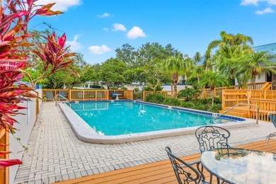 Thoughtfully updated end-unit residence in the desirable on Mangrove Bay Golf Course in Florida - for sale on GolfHomes.com, golf home, golf lot