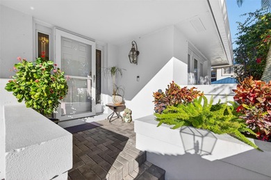 Thoughtfully updated end-unit residence in the desirable on Mangrove Bay Golf Course in Florida - for sale on GolfHomes.com, golf home, golf lot