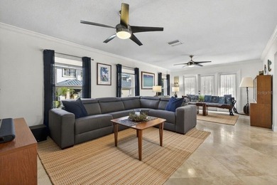 Thoughtfully updated end-unit residence in the desirable on Mangrove Bay Golf Course in Florida - for sale on GolfHomes.com, golf home, golf lot