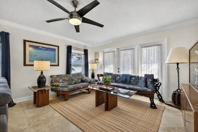 Thoughtfully updated end-unit residence in the desirable on Mangrove Bay Golf Course in Florida - for sale on GolfHomes.com, golf home, golf lot