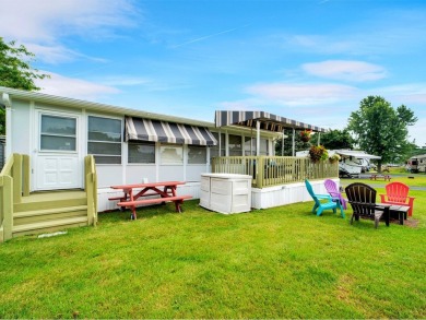 Welcome to this charming seasonal cottage in the beautiful Lake on Apple Island Golf Course At Apple Island Resort in Vermont - for sale on GolfHomes.com, golf home, golf lot