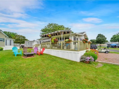 Welcome to this charming seasonal cottage in the beautiful Lake on Apple Island Golf Course At Apple Island Resort in Vermont - for sale on GolfHomes.com, golf home, golf lot