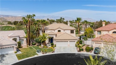 Discover the epitome of luxury w/ this two-story home, near the on Rhodes Ranch Golf Club in Nevada - for sale on GolfHomes.com, golf home, golf lot