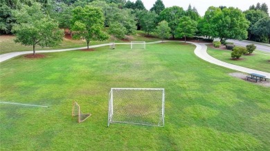 Welcome to a home that blends warmth, comfort, and community in on Hamilton Mill Golf Club in Georgia - for sale on GolfHomes.com, golf home, golf lot