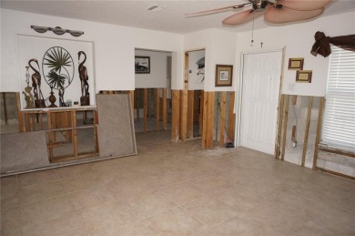 Spanish style WATERFRONT home located in desirable deed on Saint Andrews South Golf Club in Florida - for sale on GolfHomes.com, golf home, golf lot