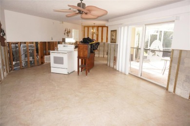 Spanish style WATERFRONT home located in desirable deed on Saint Andrews South Golf Club in Florida - for sale on GolfHomes.com, golf home, golf lot