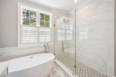 Tucked away on a quiet cul-de-sac in the highly sought-after on The Reserve Golf Club at Pawleys Island in South Carolina - for sale on GolfHomes.com, golf home, golf lot