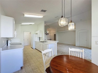 Rare Sherwood model priced to sell in the 55+ gated golf on Kings Ridge Golf Club in Florida - for sale on GolfHomes.com, golf home, golf lot