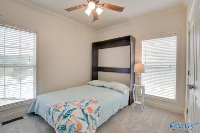 Discover the charm of this custom home that overlooks the lake on Cherokee Ridge Country Club in Alabama - for sale on GolfHomes.com, golf home, golf lot
