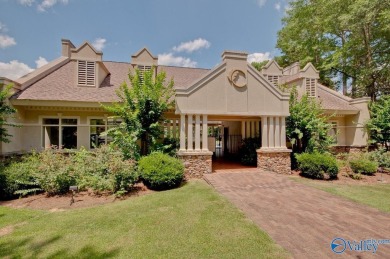Discover the charm of this custom home that overlooks the lake on Cherokee Ridge Country Club in Alabama - for sale on GolfHomes.com, golf home, golf lot