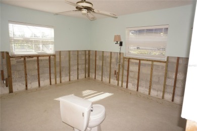 Spanish style WATERFRONT home located in desirable deed on Saint Andrews South Golf Club in Florida - for sale on GolfHomes.com, golf home, golf lot