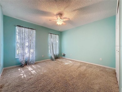 Rare Sherwood model priced to sell in the 55+ gated golf on Kings Ridge Golf Club in Florida - for sale on GolfHomes.com, golf home, golf lot