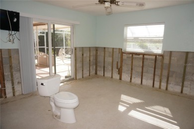 Spanish style WATERFRONT home located in desirable deed on Saint Andrews South Golf Club in Florida - for sale on GolfHomes.com, golf home, golf lot
