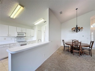 Rare Sherwood model priced to sell in the 55+ gated golf on Kings Ridge Golf Club in Florida - for sale on GolfHomes.com, golf home, golf lot
