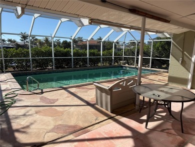 Spanish style WATERFRONT home located in desirable deed on Saint Andrews South Golf Club in Florida - for sale on GolfHomes.com, golf home, golf lot