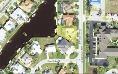 Spanish style WATERFRONT home located in desirable deed on Saint Andrews South Golf Club in Florida - for sale on GolfHomes.com, golf home, golf lot